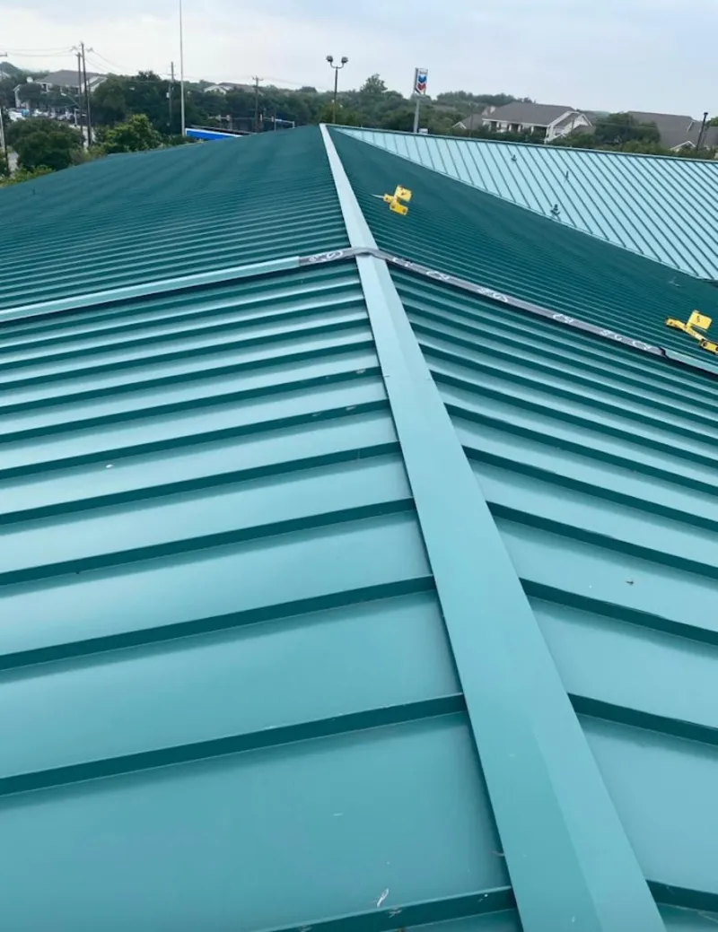 Green commercial metal roof ridge and valley for Metal Roof Repair in Starkville